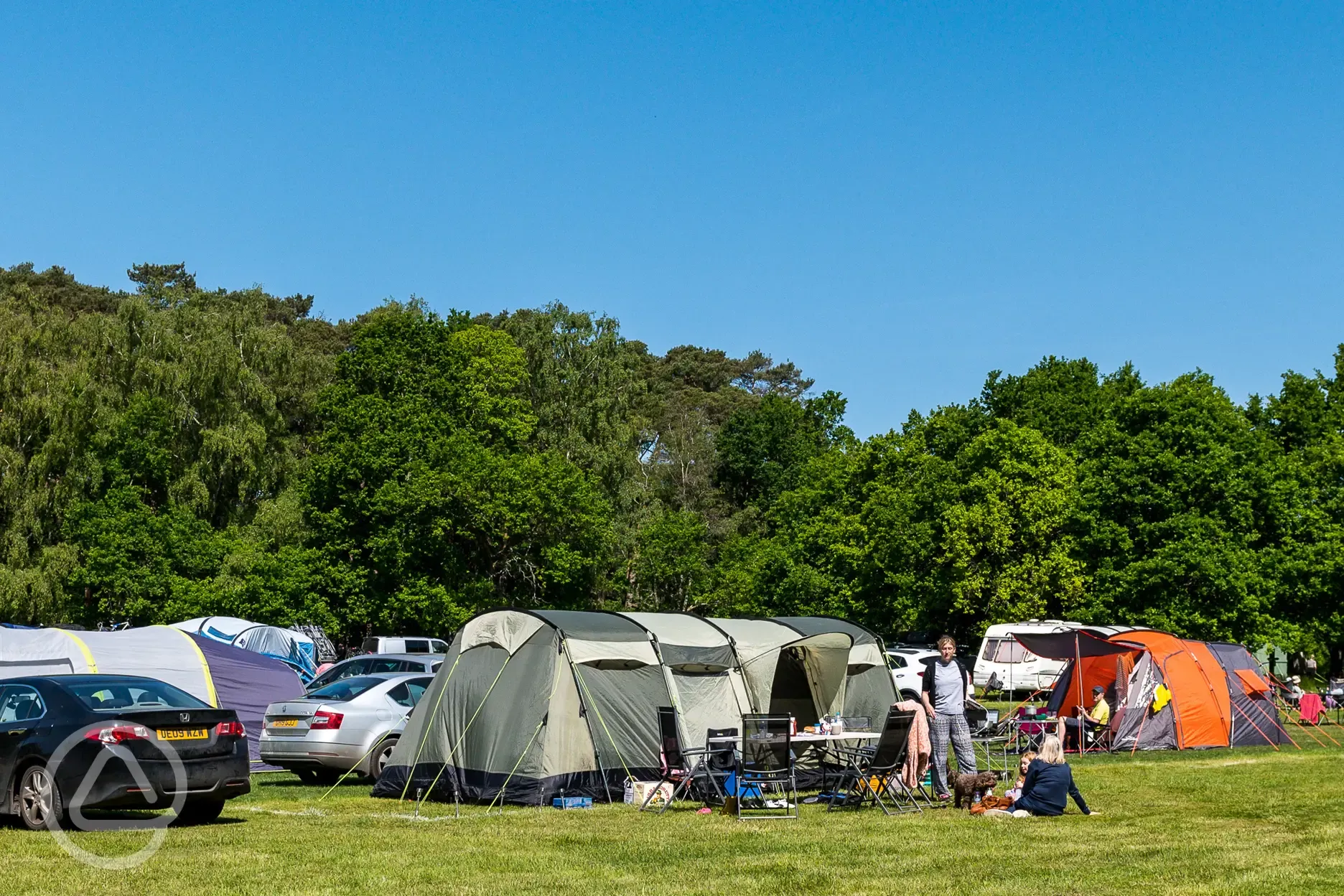 Electric grass and earth tent pitches