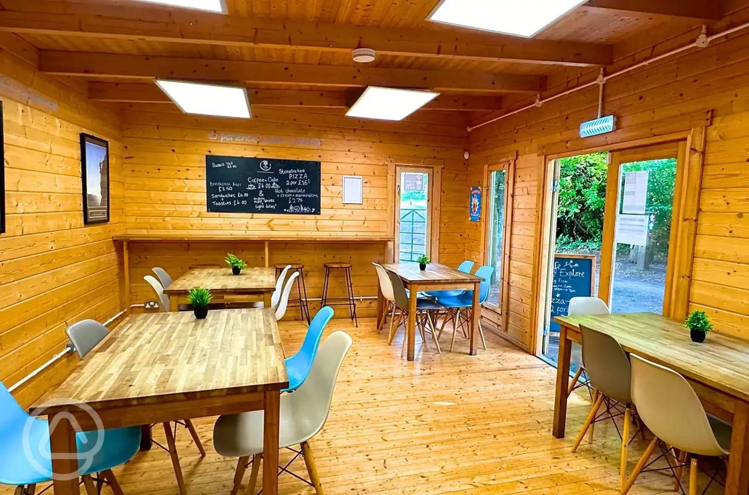 Indoor café seating area at Avon Tyrrell 