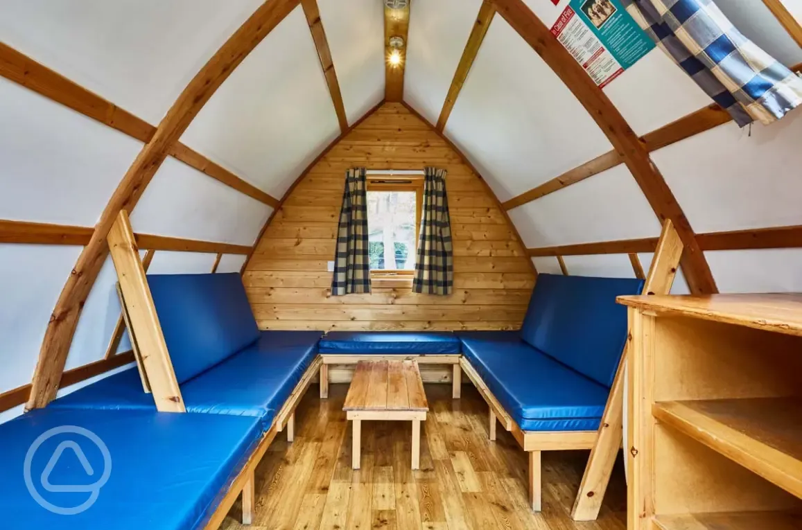 Dog friendly camping pod interior of camp beds