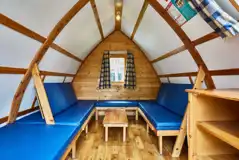 Dog friendly camping pod interior of camp beds