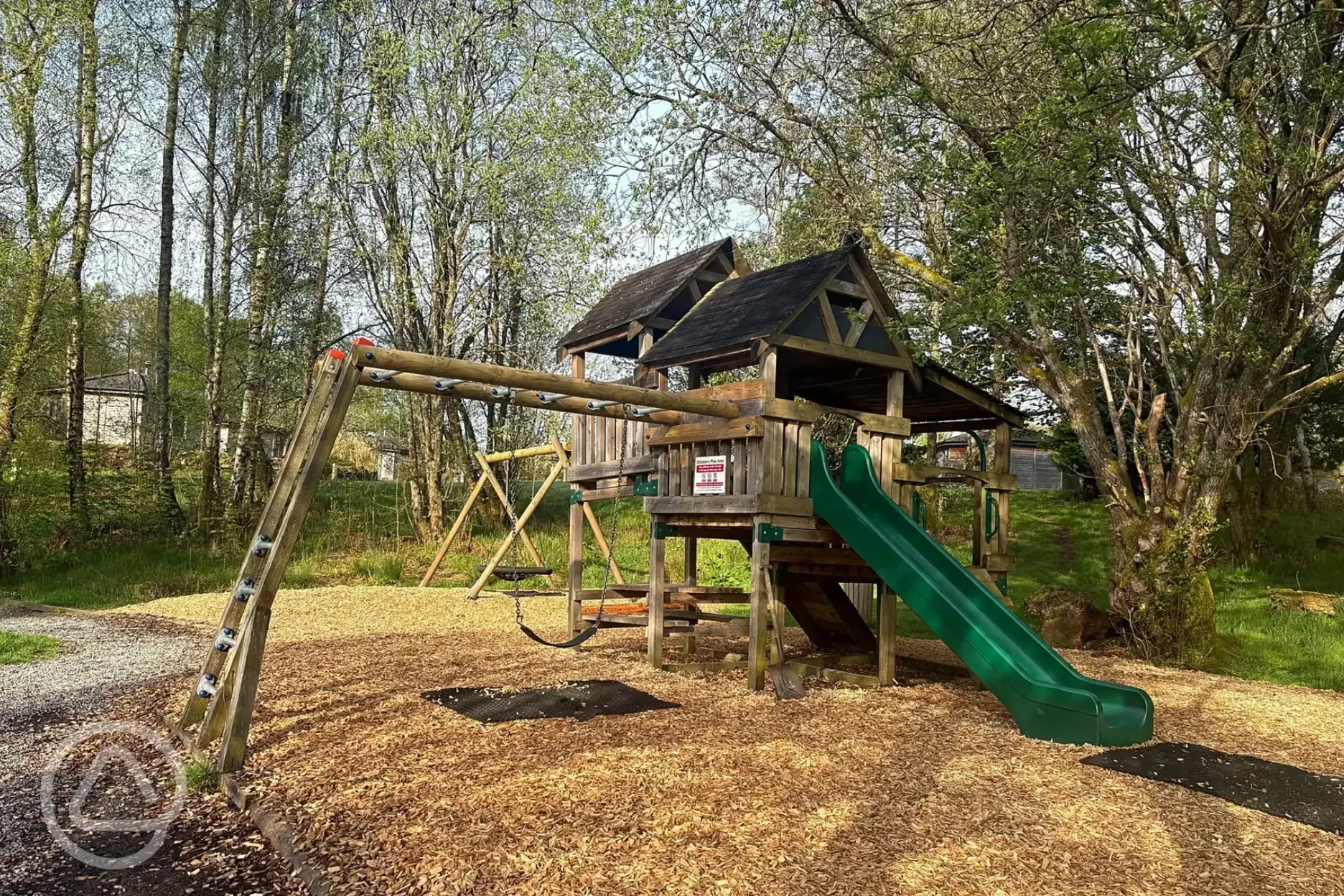 Children's climbing play area with a slide