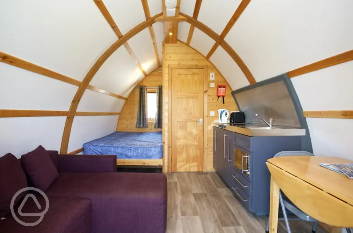 Premium ensuite glamping pod interior with a double bed