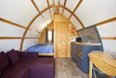 Premium ensuite glamping pod interior with a double bed