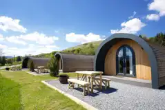 Superior ensuite glamping pods with picnic bench and hot tub