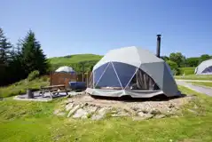 Camping dome with hot tub