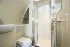 Shower, toilet, and towel rain in superior ensuite pod