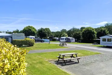 Fully serviced hardstanding pitches with private picnic benches