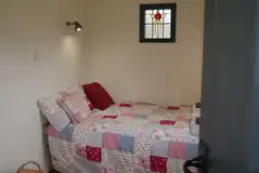 Shepherd's hut interior double bed