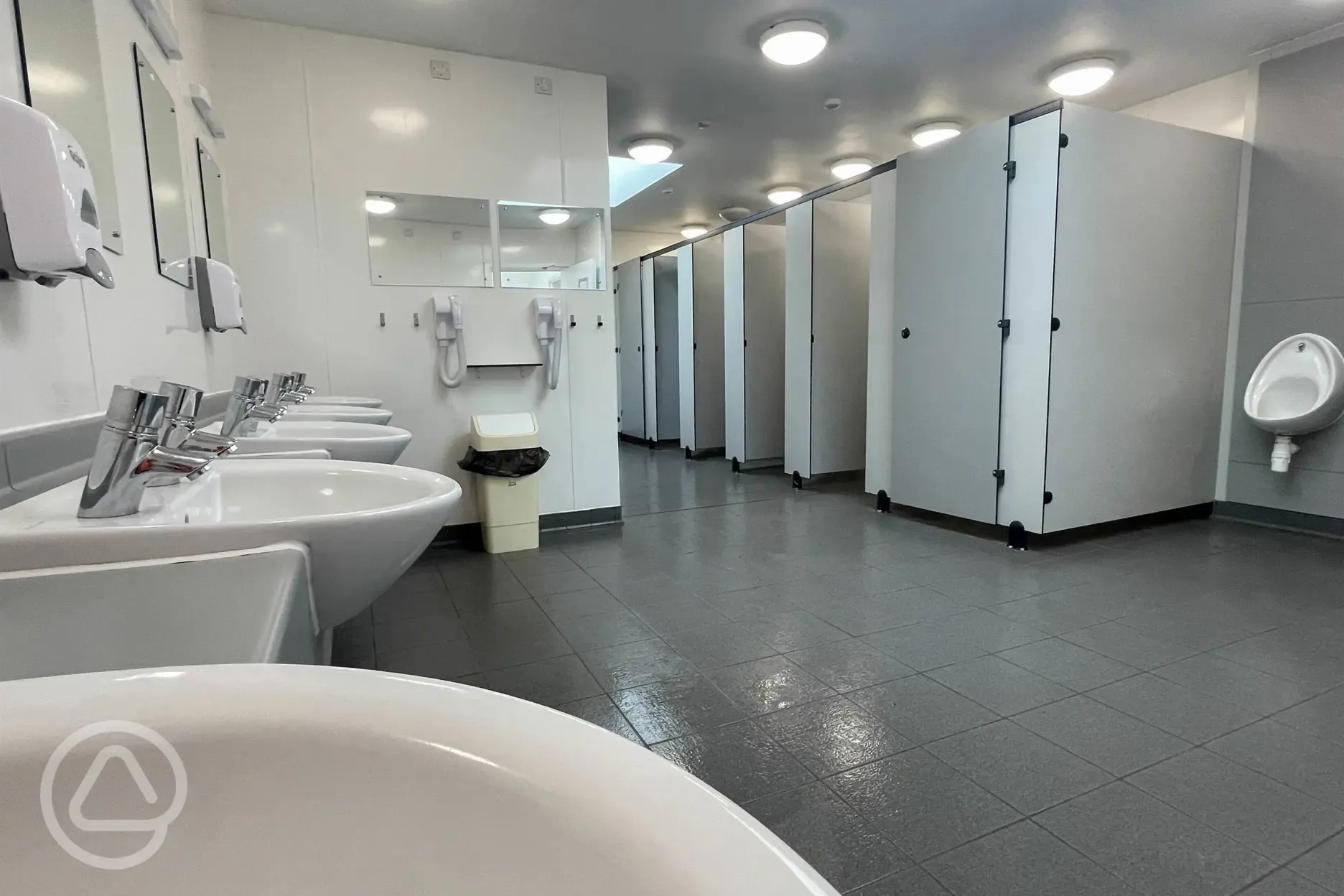 Male toilets and showers with hair dryers Male toilets and showers with hair dryers