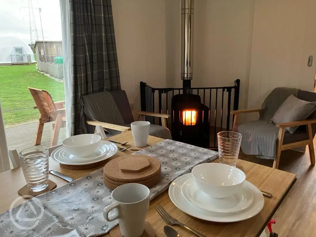 Bothy pod dining area and log burner  Bothy pod dining area and log burner