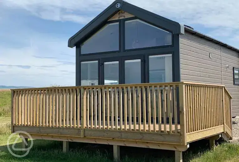 S-pod glamping cabins with outdoor deck area