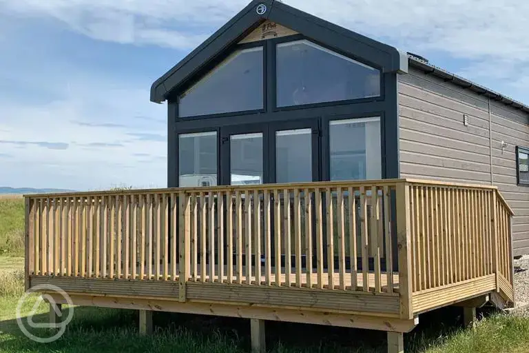 S-pod glamping cabins with outdoor deck area