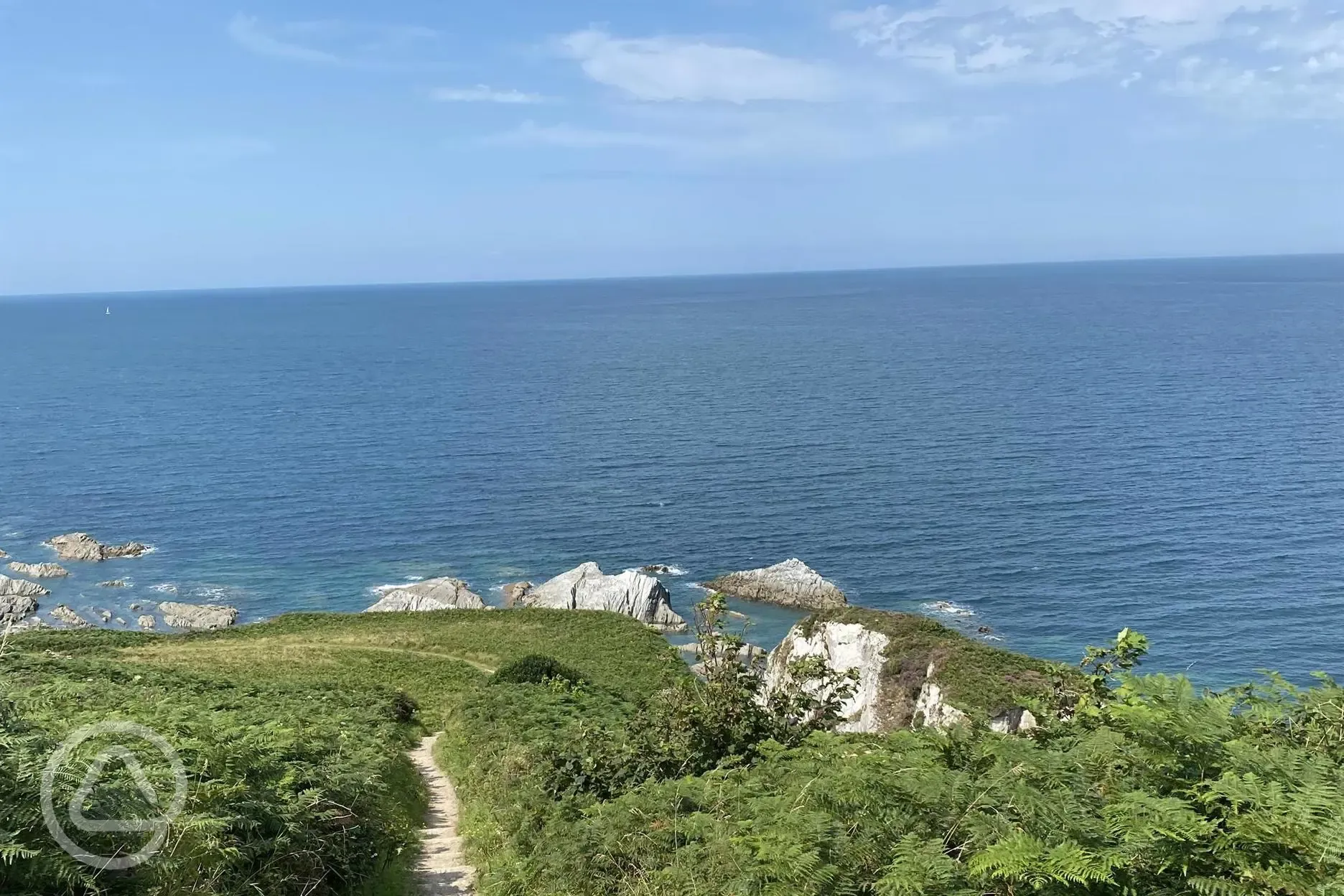 Coastal path accessible from the site