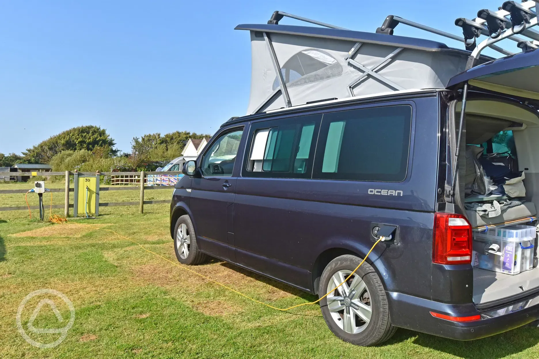 Fully serviced pitches with grass mesh