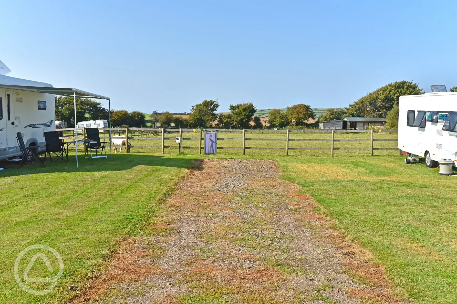 Fully serviced hardstanding pitch with driveway