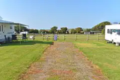 Fully serviced hardstanding pitch with driveway