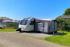 Hardstanding pitches with grass areas between