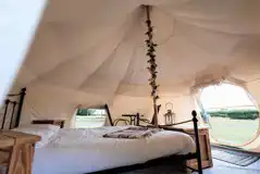 Lotus Belle Tent with a double bed (bring or hire bedding)