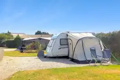 Hardstanding pitches with grass areas between