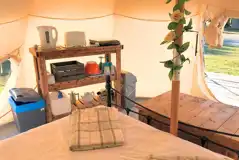 Lotus Belle Tent with a kettle and gas stove