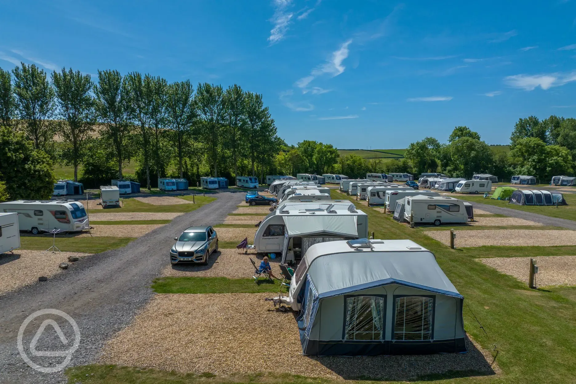 Fully serviced hardstanding pitches with primary gravel