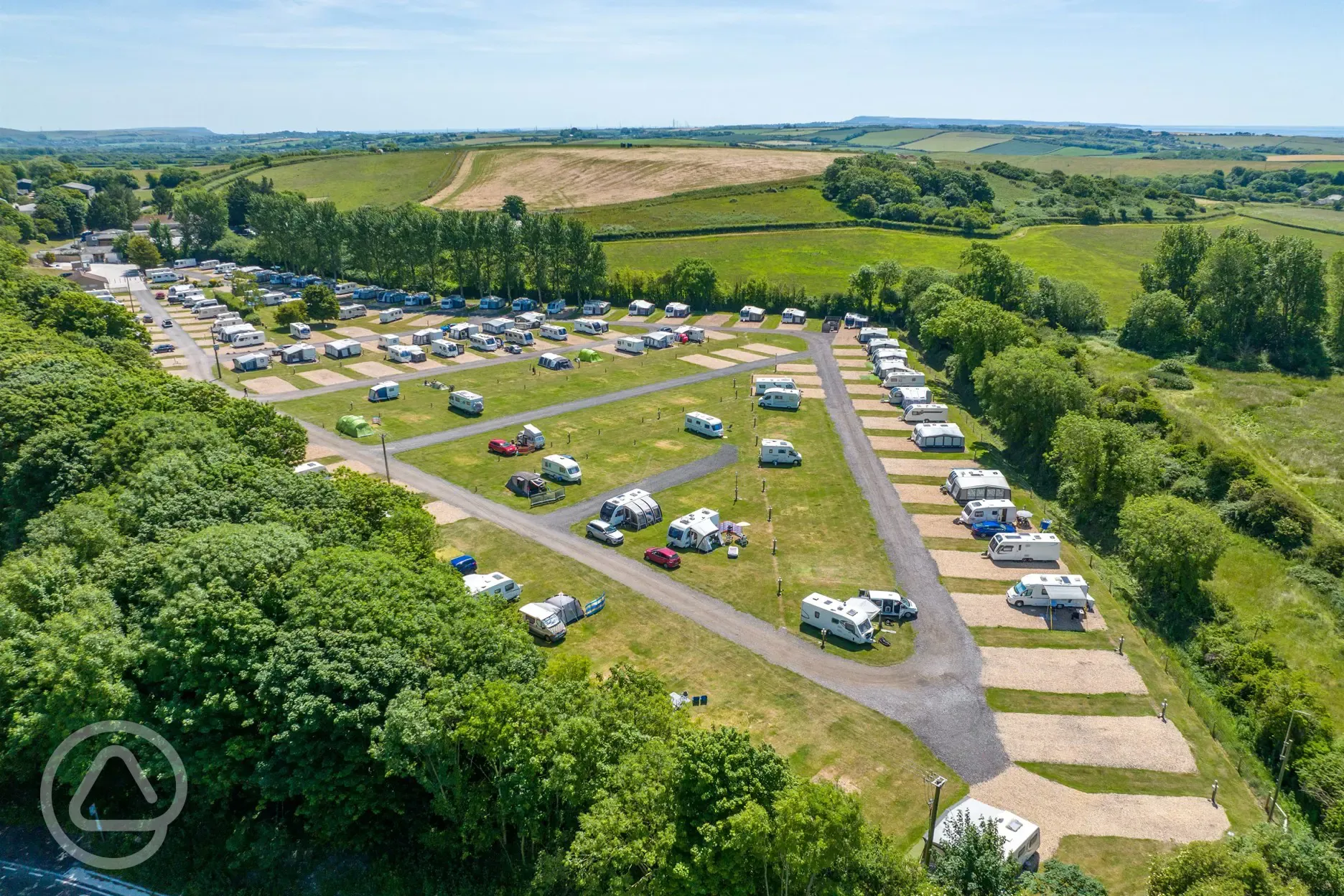 Aerial of Portesham Dairy Farm Campsite with grass and hardstanding pitches