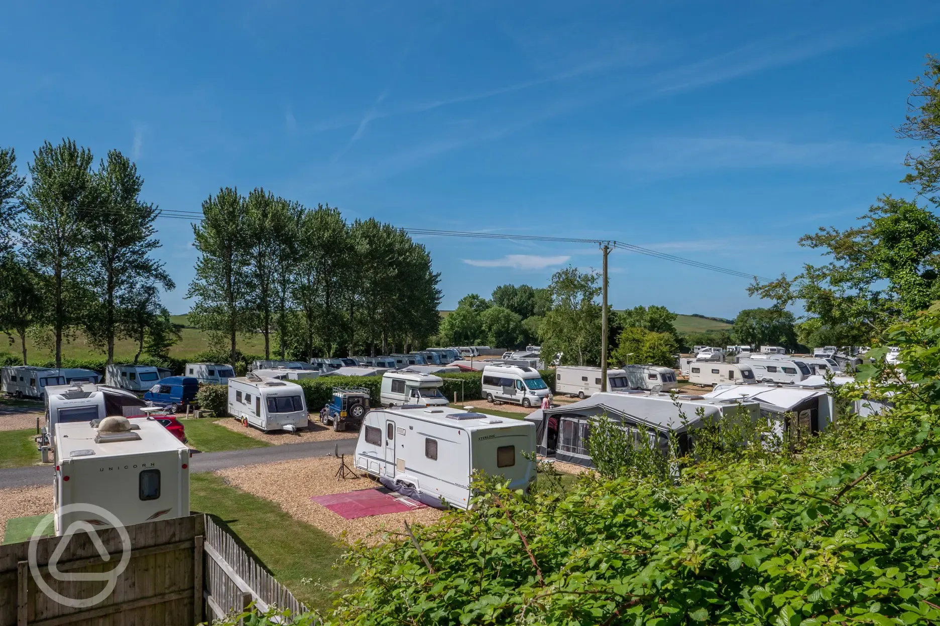 View of the hardstanding pitches with primary gravel