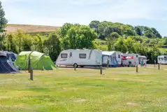 Standard grass pitches welcoming tents and tourers