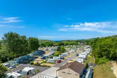 Aerial of Portesham Dairy Farm Campsite with views to Chesil Beach