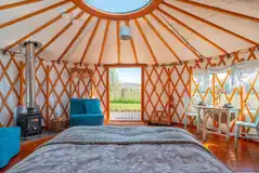 Furnished yurt with a wood burner