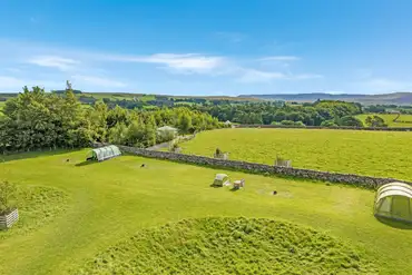 Grass tent pitches at Low Greenside Farm Campsite