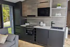 Blencathra camping pod fully equipped kitchen with microwave, kettle, and oven