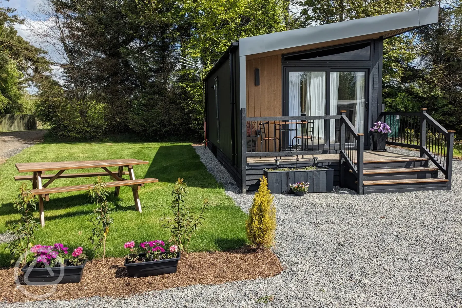 Blencathra camping pod with parking space, picnic bench, and decking
