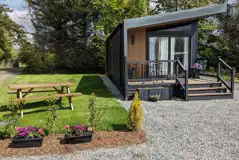 Blencathra camping pod with parking space, picnic bench, and decking