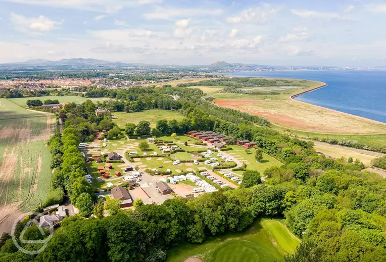 Aerial view of Drummohr Camping and Glamping Site with views towards Edinburgh