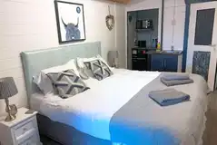 Double deluxe bothy interior with double bed