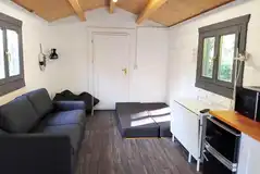 Glamping bothy cabin interior with access to shared facilities nearby