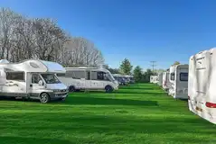 Electric grass touring pitches with 10amp electric hook up