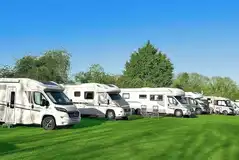 Electric grass touring pitches at Cottage of Content Pub Camping and Caravan