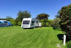 Serviced grass pitches with a 10 amp hook up Serviced grass pitches with a 10 amp hook up