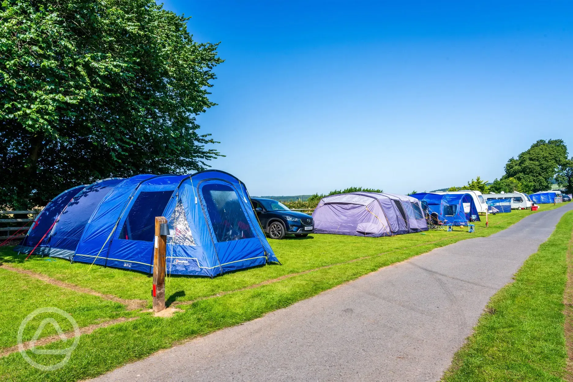 Electric grass pitches for tents, caravans, and motorhomes