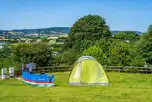 Tent on electric grass pitch