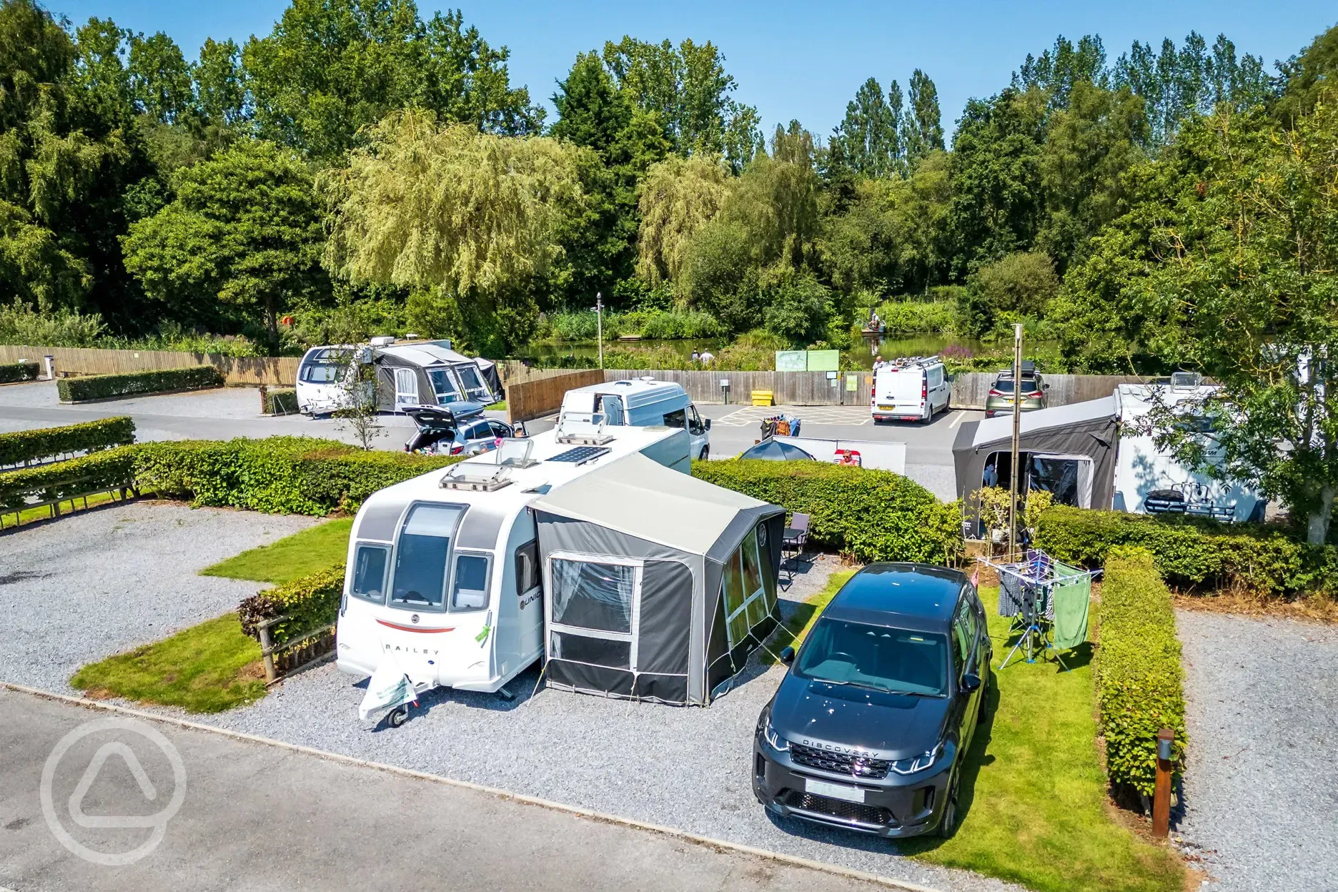 Caravan and awning on electric hardstanding pitch (8m)