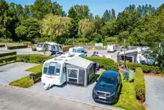 Caravan and awning on electric hardstanding pitch (8m)