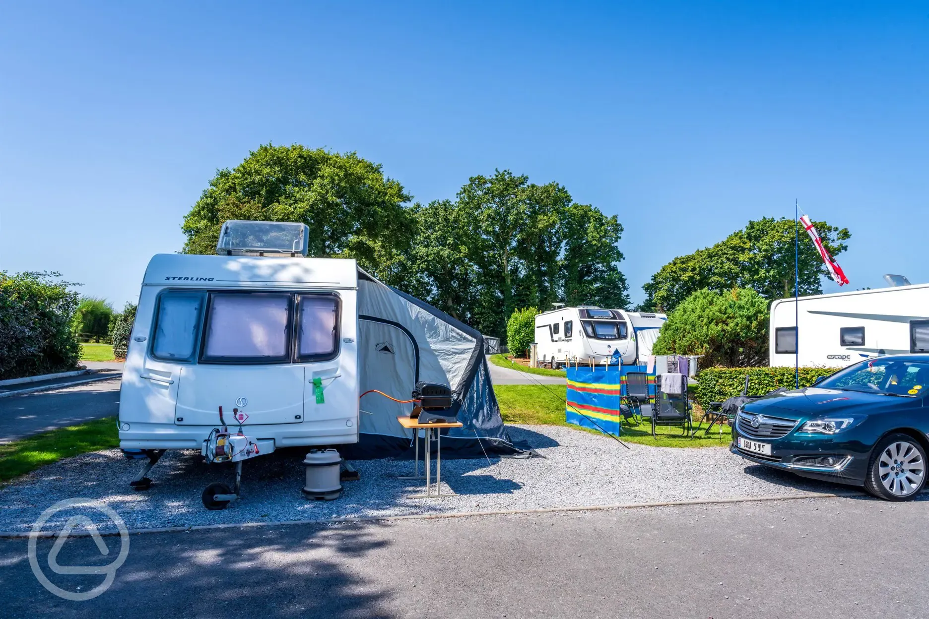 Caravan and awning on electric hardstanding pitch (7m)