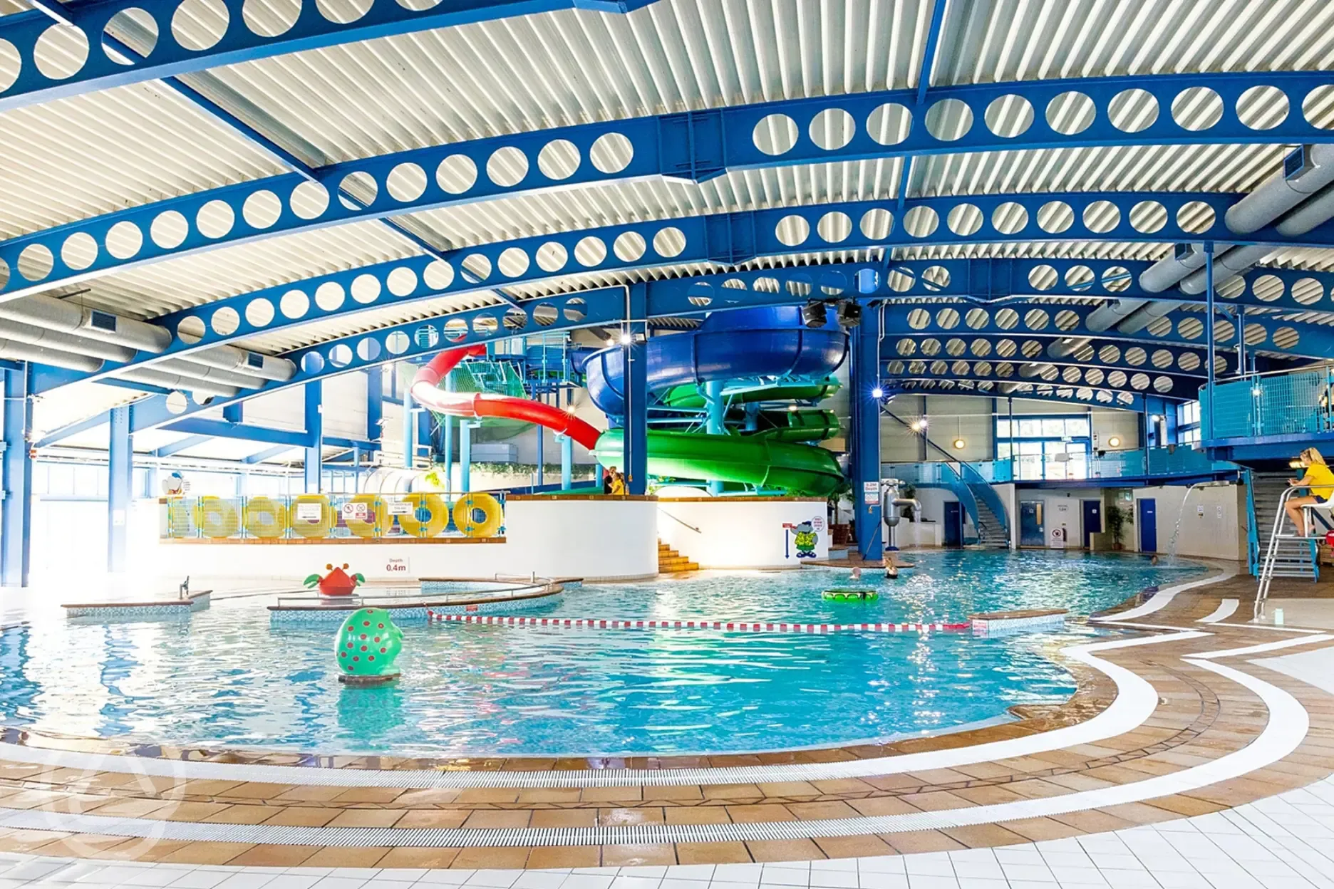 Oasis indoor swimming pool with flumes, baby and toddler pool and lazy river