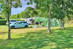 Standard electric hardstanding pitches with an electric hook up and grass area Standard electric hardstanding pitches with an electric hook up and grass area