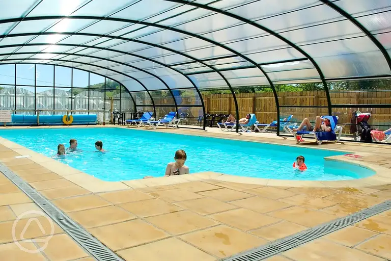 Kids playing in the indoor heated swimming pool at River Valley Holiday Park