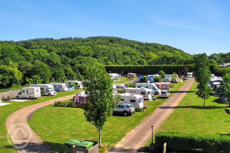 Aerial view of the grass and hardstanding pitches at River Valley Holiday Park