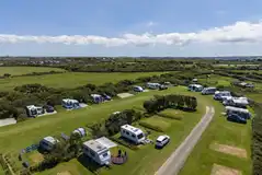Premium fully serviced grass and hardstanding pitches with optional electric